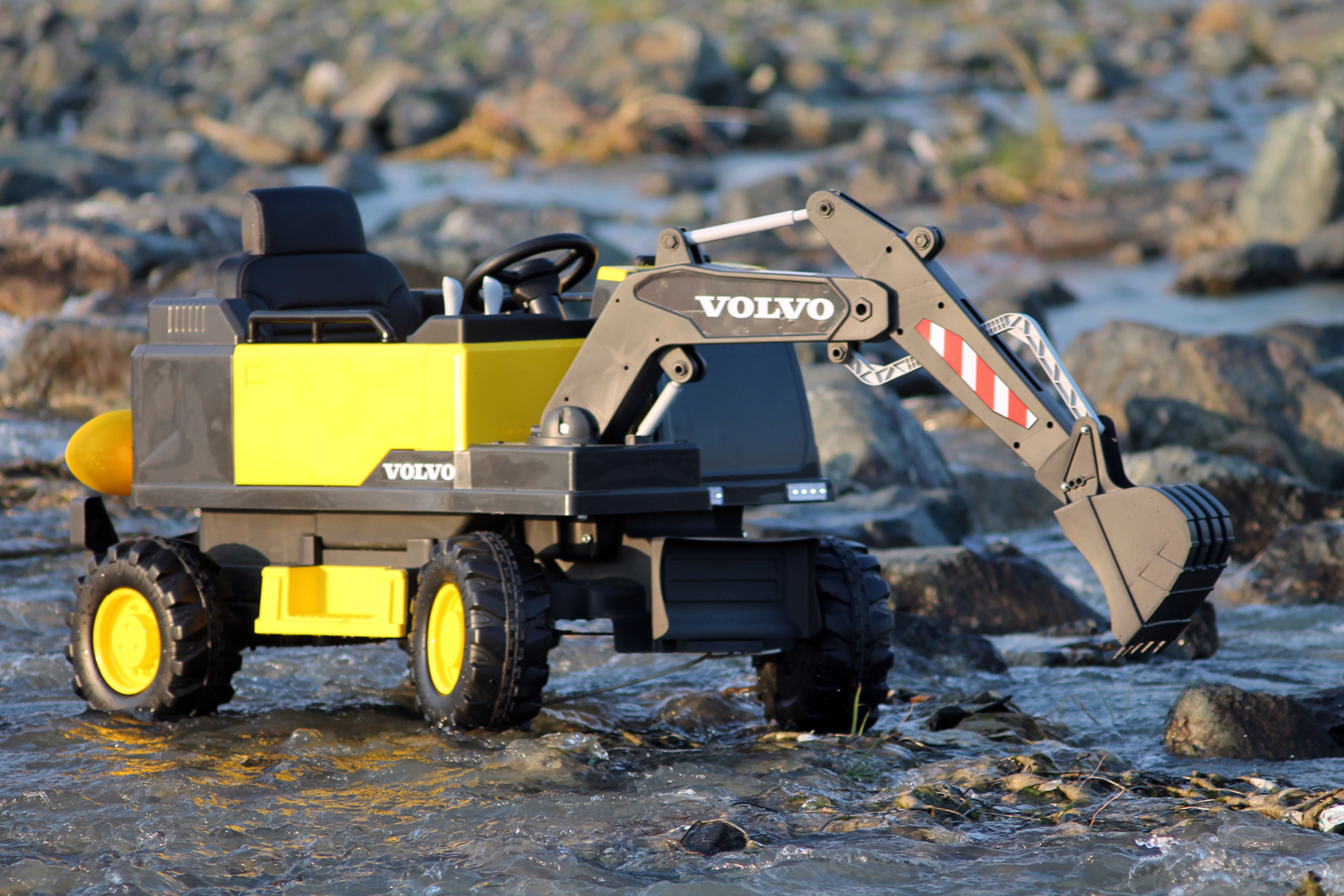 Elektriline lasteekskavaator Volvo, 90W 12V, elektrilise laadijaga, polstriga iste, kollane - Pilt 3